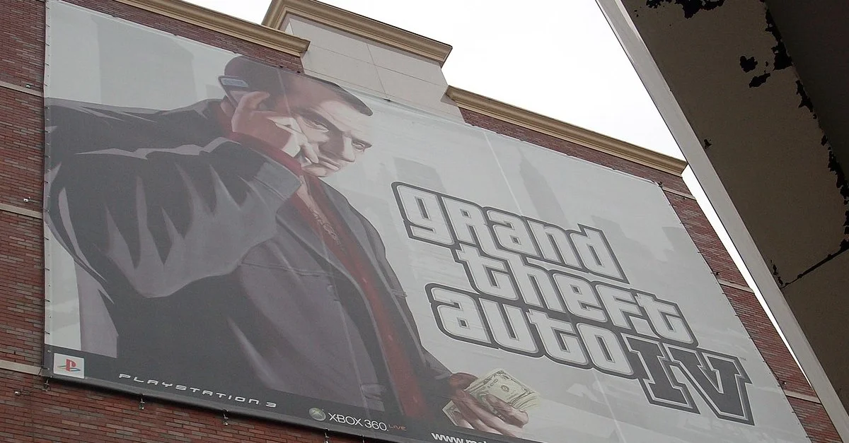 Bild: Ein Poster von „GTA 4“ auf der Hausmauer eines Gebäudes in Brooklyn / Bild: mindy1215, CC BY-SA 2.0, via Wikimedia Commons (Bild zugeschnitten)