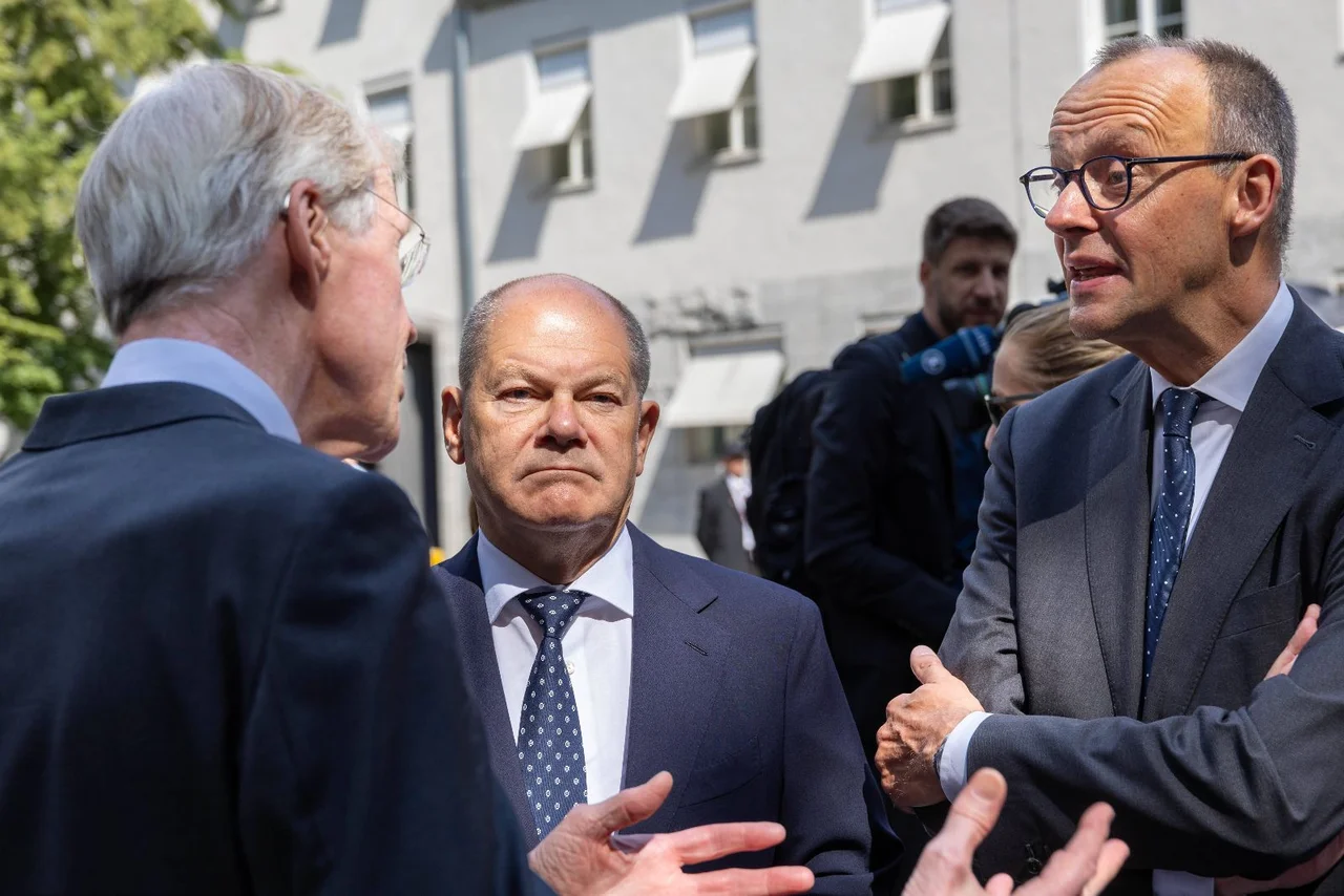 Merz (CDU) und Scholz (SPD) sind bei den Deutschen nicht gerade beliebt.